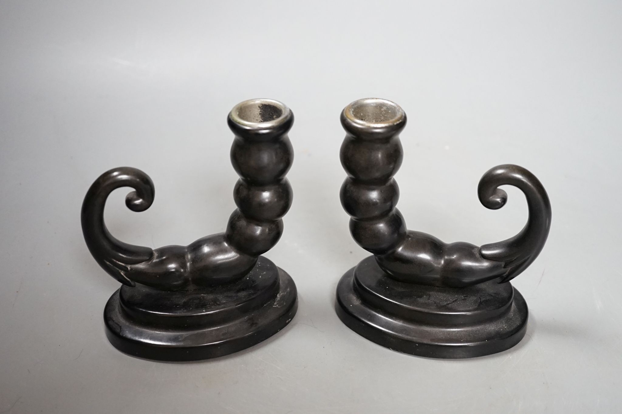 An unusual pair of Bakelite candlesticks, 12cm